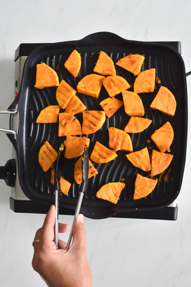 grilling sweet potatoes on medium flame - priyascurrynation.com