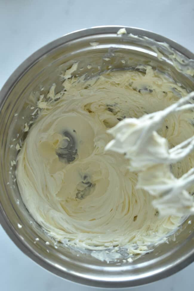 beat butter until smooth and lighten in color to make the best buttercream.
