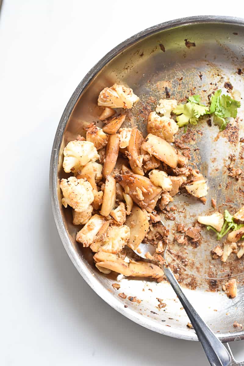 Vegan, vegetarian cauliflower recipe that is perfect with rice, salad and gravy.